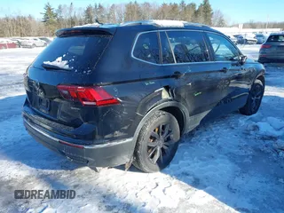 2022 Volkswagen Tiguan SE z VIN 3VV2B7AX4NM036657, wystawiony jako IAAI lot #41591503 z przebiegiem 45 416 mil mil oraz . Historia ofert i sprzedaży dostępna na DreamBid. Obrazek 4.