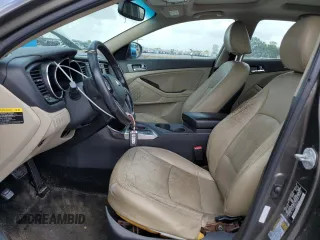 2013 Kia Optima EX z VIN 5XXGN4A72DG188821, wystawiony jako Copart lot #65546495 z przebiegiem 187 286 mil mil oraz Szkoda całkowita • Salvage title. Historia ofert i sprzedaży dostępna na DreamBid. Obrazek 7.