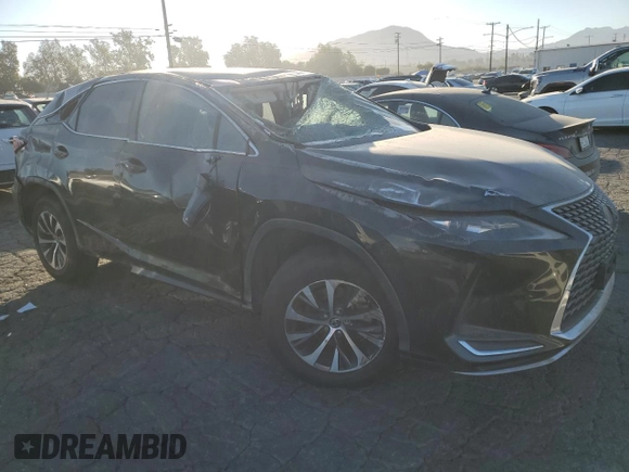 2020 Lexus RX with VIN 2T2AZMAA7LC171195, listed as a Copart auction lot 77195854 with 129,332 mi miles and Clean Title. Bid and sale history available at carsss.com. Image 4.