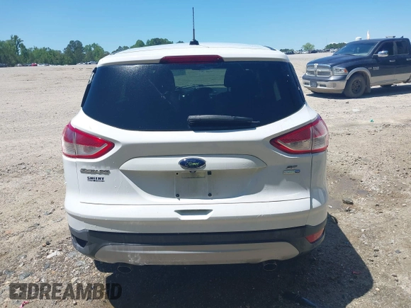 2014 Ford Escape SE with VIN 1FMCU9G90EUB76911, listed as a IAAI auction lot 42143518 with 123,466 mi miles and . Bid and sale history available at DreamBid. Image 16.
