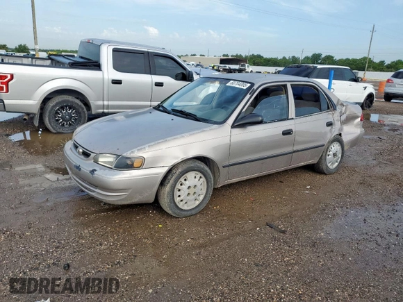1999 Toyota Corolla VE z VIN 1NXBR12E0XZ215258, wystawiony jako Copart lot #60704095 z przebiegiem Nie podano mil oraz Szkoda całkowita • Salvage title. Historia ofert i sprzedaży dostępna na DreamBid. Obrazek 1.