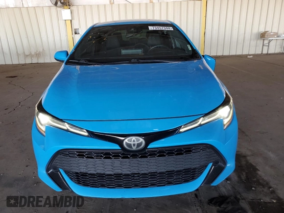 2019 Toyota Corolla Hatchback SE with VIN JTNK4RBE7K3051180, listed as a Copart auction lot 73457344 with 95,921 mi miles and Salvage Title. Bid and sale history available at carsss.com. Image 5.