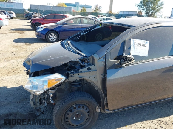 2013 Toyota Yaris L with VIN JTDJTUD33DD550976, listed as a IAAI auction lot 40691482 with 149,614 mi miles. Bid and sale history available at carsss.com. Image 11.