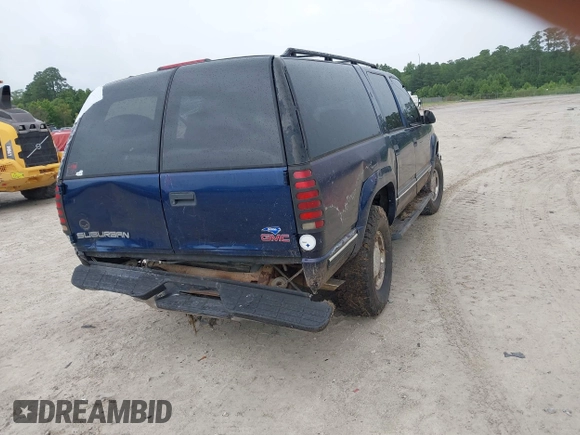 1999 GMC Suburban with VIN 3GKFK16R2XG501319, listed as a IAAI auction lot 42491117 with 231,561 mi miles and . Bid and sale history available at DreamBid. Image 4.