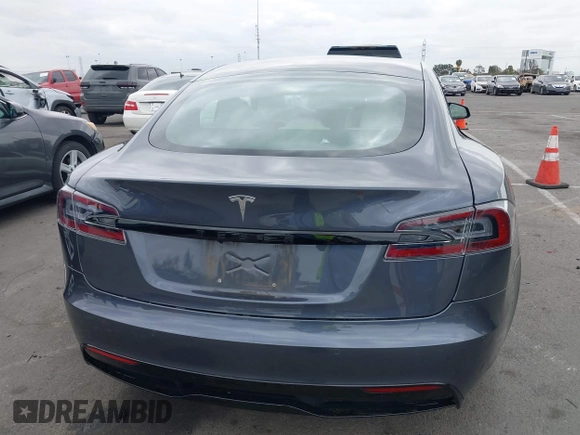 2021 Tesla Model S Long Range с VIN 5YJSA1E57MF441387, выставлен на аукционе IAAI как лот 42034307 с пробегом Не указан миль и . История ставок и продаж доступна на DreamBid. Изображение 16.