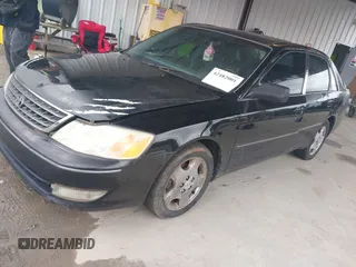 2003 Toyota Avalon XL z VIN 4T1BF28B33U291465, wystawiony jako IAAI lot #42482001 z przebiegiem 203 028 mil mil oraz . Historia ofert i sprzedaży dostępna na DreamBid. Obrazek 2.