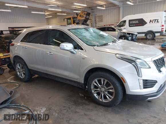 2020 Cadillac XT5 Premium Luxury FWD with VIN 1GYKNCRS5LZ172325, listed as a IAAI auction lot 41275366 with 102,796 mi miles. Bid and sale history available at carsss.com. Image 1.