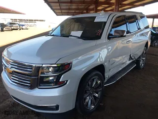2016 Chevrolet Tahoe LTZ with VIN 1GNSKCKC4GR359442, listed as a IAAI auction lot 41871814 with 158,533 mi miles. Bid and sale history available at carsss.com. Image 2.