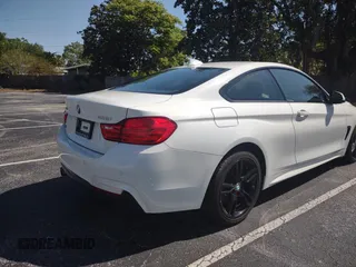2016 BMW 4 Series 428i xDrive with VIN WBA3N9C58GK249703, listed as a Copart auction lot 53071765 with 83,881 mi miles and Clean Title. Bid and sale history available at carsss.com. Image 4.
