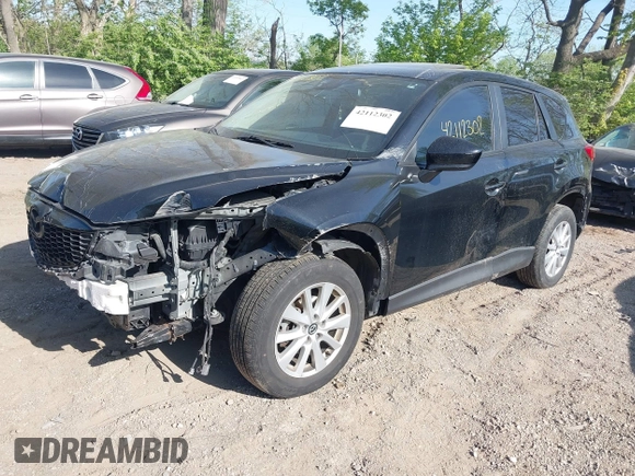 2014 Mazda CX-5 Touring z VIN JM3KE4CY4E0328880, wystawiony jako IAAI lot #42112302 z przebiegiem 185 228 mil mil oraz . Historia ofert i sprzedaży dostępna na DreamBid. Obrazek 18.