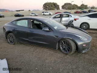 2023 Tesla Model 3 with VIN 5YJ3E1EA9PF642587, listed as a Copart auction lot 79334144 with 0 mi miles and Salvage Title. Bid and sale history available at carsss.com. Image 4.