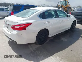 2016 Nissan Altima SR with VIN 1N4AL3AP0GC223999, listed as a IAAI auction lot 41838999 with 159,918 mi miles and . Bid and sale history available at carsss.com. Image 4.