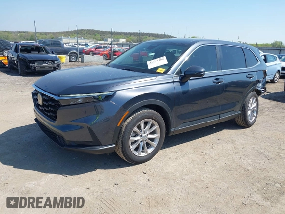 2025 Honda CR-V EX-L with VIN 2HKRS4H73SH401803, listed as a IAAI auction lot 41973265 with 13,588 mi miles and . Bid and sale history available at DreamBid. Image 2.