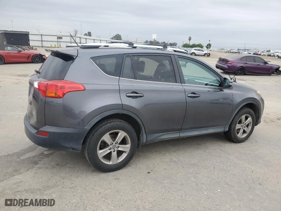 2015 Toyota RAV4 XLE with VIN JTMRFREV7FD139008, listed as a Copart auction lot 52997825 with 169,369 mi miles and Salvage Title. Bid and sale history available at carsss.com. Image 3.