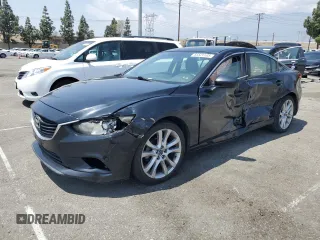 2014 Mazda 6 i Touring with VIN JM1GJ1V62E1136128, listed as a Copart auction lot 55521105 with 90,664 mi miles and Salvage title. Bid and sale history available at DreamBid. Image 1.