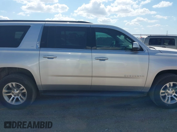 2017 Chevrolet Suburban LT with VIN 1GNSCHKC9HR287701, listed as a IAAI auction lot 42510491 with 166,568 mi miles and . Bid and sale history available at DreamBid. Image 13.