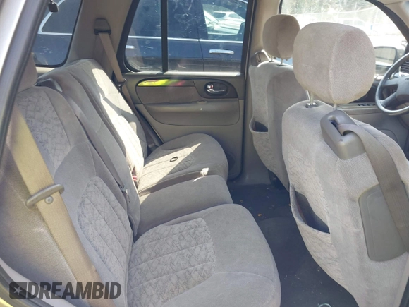 2003 GMC Envoy SLT z VIN 1GKDS13S932106295, wystawiony jako IAAI lot #41594814 z przebiegiem 199 597 mil mil oraz . Historia ofert i sprzedaży dostępna na DreamBid. Obrazek 8.