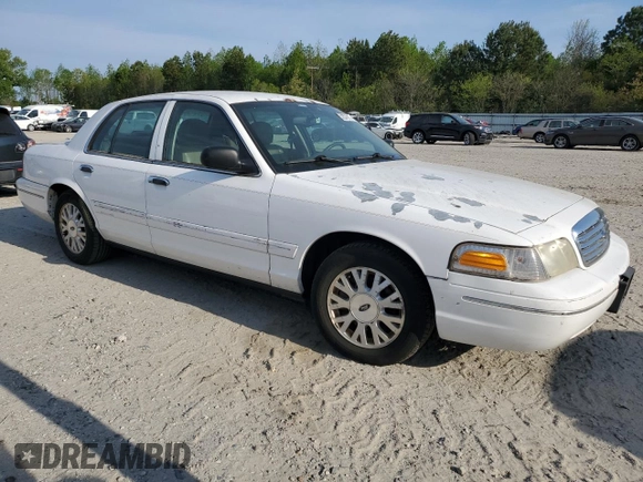 2003 Ford Crown Victoria LX z VIN 2FAFP74W03X209148, wystawiony jako Copart lot #53274575 z przebiegiem 127 739 mil mil oraz Szkody całkowita. Historia ofert i sprzedaży dostępna na DreamBid. Obrazek 4.