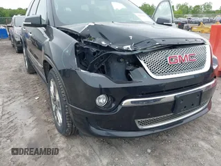 2011 GMC Acadia Denali z VIN 1GKKRTED2BJ373201, wystawiony jako IAAI lot #42233620 z przebiegiem 169 983 mil mil oraz . Historia ofert i sprzedaży dostępna na DreamBid. Obrazek 6.