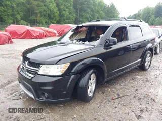 2012 Dodge Journey SXT z VIN 3C4PDDBG0CT183184, wystawiony jako IAAI lot #42372821 z przebiegiem Nie podano mil oraz . Historia ofert i sprzedaży dostępna na DreamBid. Obrazek 2.