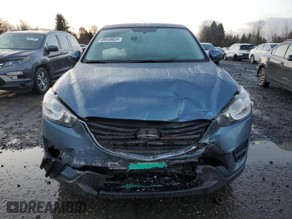 2016 Mazda CX-5 Sport with VIN JM3KE4BY3G0876082, listed as a Copart auction lot 86438024 with 203,544 mi miles and Salvage Title. Bid and sale history available at carsss.com. Image 5.