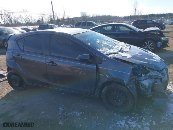 2015 Toyota Prius c One with VIN JTDKDTB36F1113749, listed as a IAAI auction lot 41366238 with 121,610 mi miles. Bid and sale history available at carsss.com. Image 13.