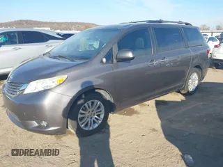 2016 Toyota Sienna XLE with VIN 5TDYK3DC6GS710062, listed as a IAAI auction lot 40953646 with 145,233 mi miles. Bid and sale history available at carsss.com. Image 2.