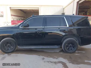 2018 Chevrolet Tahoe Commercial with VIN 1GNSKDEC8JR351269, listed as a IAAI auction lot 41602443 with 79,970 mi miles. Bid and sale history available at carsss.com. Image 14.