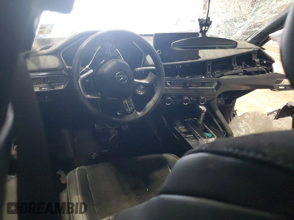 2024 Acura Integra Technology z VIN 19UDE4H67RA018751, wystawiony jako Copart lot #56177405 z przebiegiem 7 253 mil mil oraz Szkoda całkowita • Salvage title. Historia ofert i sprzedaży dostępna na DreamBid. Obrazek 8.