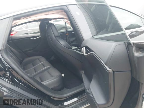 2018 Tesla Model S 75D with VIN 5YJSA1E22JF282828, listed as a IAAI auction lot 41595543 with 72,571 mi miles and . Bid and sale history available at DreamBid. Image 8.