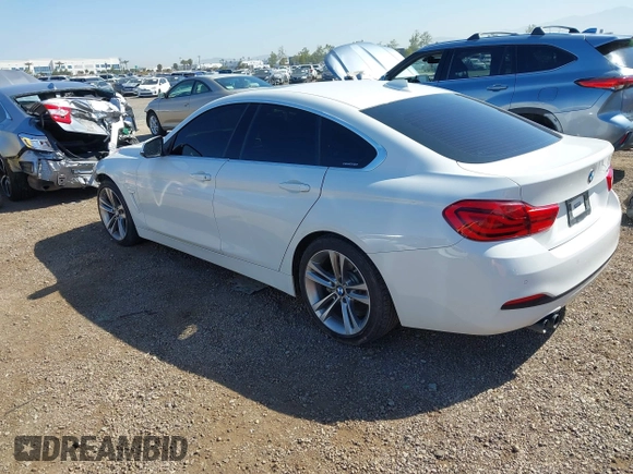 2019 BMW 4 Series 430i with VIN WBA4J1C54KBM18190, listed as a IAAI auction lot 42012759 with 73,598 mi miles. Bid and sale history available at carsss.com. Image 3.