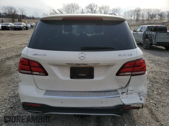 2018 Mercedes-Benz GLE 43 AMG with VIN 4JGDA6EB7JA998084, listed as a Copart auction lot 52675415 with 133,405 mi miles and Salvage Title. Bid and sale history available at DreamBid. Image 6.