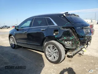2024 Cadillac XT5 FWD Premium Luxury with VIN 1GYKNCRS6RZ718865, listed as a Copart auction lot 88272325 with 10,278 mi miles and Salvage title. Bid and sale history available at DreamBid. Image 2.
