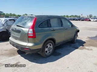 2009 Honda CR-V LX with VIN 5J6RE48399L029677, listed as a IAAI auction lot 38701558 with 136,294 mi miles. Bid and sale history available at carsss.com. Image 4.
