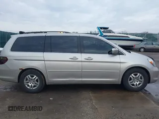 2006 Honda Odyssey EX-L z VIN 5FNRL38766B018014, wystawiony jako IAAI lot #41497144 z przebiegiem 230 225 mil mil oraz . Historia ofert i sprzedaży dostępna na DreamBid. Obrazek 13.