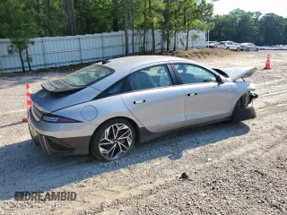 2023 Hyundai Ioniq 6 Preferred z VIN KMHM34AC0PA030141, wystawiony jako Copart lot #57694704 z przebiegiem 7051 mil mil oraz Szkoda całkowita • Salvage title. Historia ofert i sprzedaży dostępna na DreamBid. Obrazek 3.