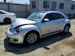 2016 Volkswagen Beetle with VIN 3VWF07AT9GM619860, listed as a Copart auction lot 56357605 with 67,212 mi miles and Salvage Title. Bid and sale history available at DreamBid. Image 1.