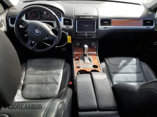 2012 Volkswagen Touareg с VIN WVGEG9BP1CD007581, выставлен на аукционе Copart как лот 47958355 с пробегом 79 649 миль миль и Списание • Salvage title. История ставок и продаж доступна на DreamBid. Изображение 8.