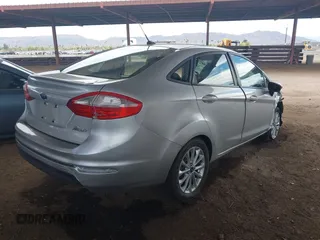 2014 Ford Fiesta SE with VIN 3FADP4BJ9EM196038, listed as a IAAI auction lot 41916159 with 85,582 mi miles. Bid and sale history available at carsss.com. Image 4.