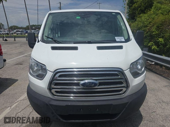 2018 Ford Transit with VIN 1FTYR1ZMXJKB47999, listed as a IAAI auction lot 42787302 with 140,957 mi miles and . Bid and sale history available at DreamBid. Image 14.