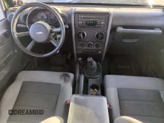 2008 Jeep Wrangler Unlimited X with VIN 1J4GA39108L509275, listed as a Copart auction lot 52386455 with 220,829 mi miles and Salvage Title. Bid and sale history available at carsss.com. Image 8.