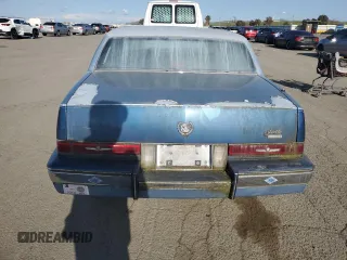 1988 Cadillac Seville z VIN 1G6KS5152JU809989, wystawiony jako Copart lot #51385205 z przebiegiem 40 217 mil mil oraz Czysty tytuł • Clean title. Historia ofert i sprzedaży dostępna na DreamBid. Obrazek 6.