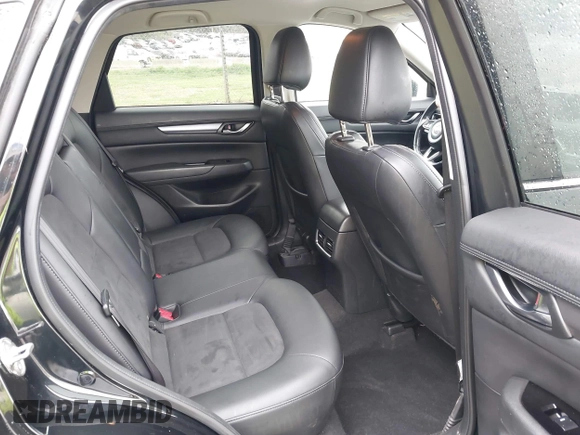 2020 Mazda CX-5 Touring with VIN JM3KFACM9L0770933, listed as a IAAI auction lot 41921464 with 75,997 mi miles. Bid and sale history available at carsss.com. Image 8.