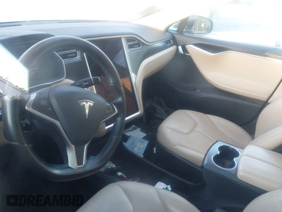 2014 Tesla Model S 60 z VIN 5YJSA1H19EFP51406, wystawiony jako IAAI lot #41561395 z przebiegiem Nie podano mil oraz . Historia ofert i sprzedaży dostępna na DreamBid. Obrazek 17.