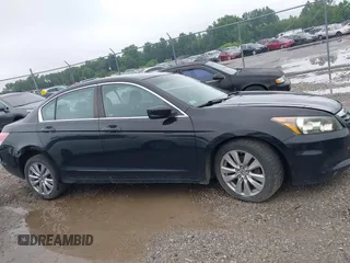 2012 Honda Accord EX with VIN 1HGCP2E77CA028100, listed as a IAAI auction lot 42648699 with 167,661 mi miles and . Bid and sale history available at DreamBid. Image 13.