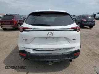 2021 Mazda CX-9 Touring with VIN JM3TCBCY4M0524573, listed as a Copart auction lot 60961165 with 58,408 mi miles and Salvage title. Bid and sale history available at DreamBid. Image 6.