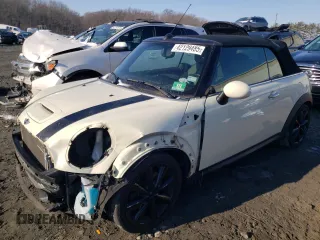 2014 MINI Convertible S with VIN WMWZP3C58ET707569, listed as a Copart auction lot 42129485 with 62,343 mi miles and Salvage Title. Bid and sale history available at DreamBid. Image 1.