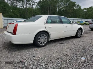 2006 Cadillac DTS 1SC z VIN 1G6KD57Y26U177384, wystawiony jako Copart lot #58200665 z przebiegiem 122 356 mil mil oraz Szkoda całkowita • Salvage title. Historia ofert i sprzedaży dostępna na DreamBid. Obrazek 3.