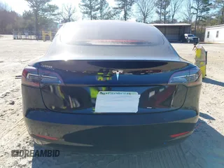 2019 Tesla Model 3 Mid Range with VIN 5YJ3E1EA2KF306286, listed as a IAAI auction lot 41699127 with 56,249 mi miles and . Bid and sale history available at DreamBid. Image 16.