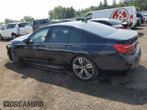 2017 BMW 7 Series 750i xDrive with VIN WBA7B0C57HG527064, listed as a Copart auction lot 62463405 with 103,454 mi miles and Salvage title. Bid and sale history available at DreamBid. Image 2.